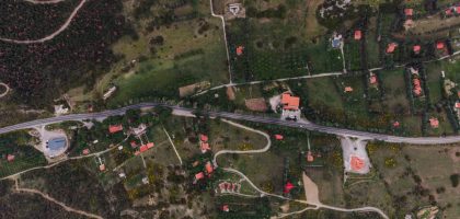 Aerial landscape of rural countryside with road and fields in Delphi, Greece.