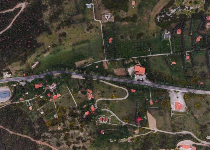 Aerial landscape of rural countryside with road and fields in Delphi, Greece.