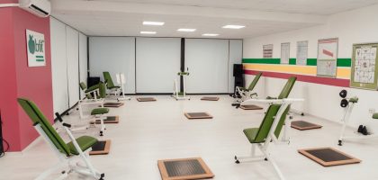 Bright and spacious gym interior featuring modern green exercise machines in Yalova.