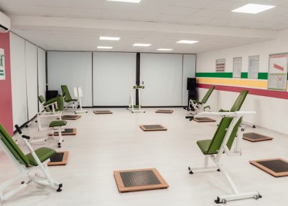 Bright and spacious gym interior featuring modern green exercise machines in Yalova.